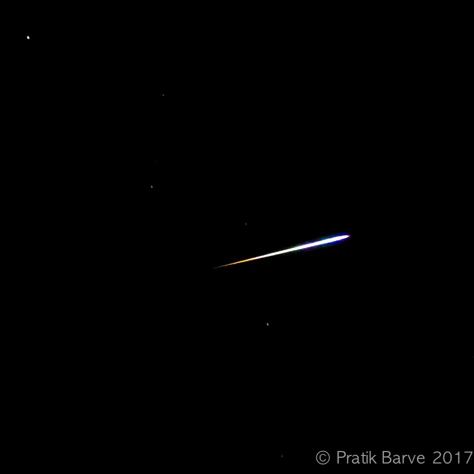 Shooting star with visible trail